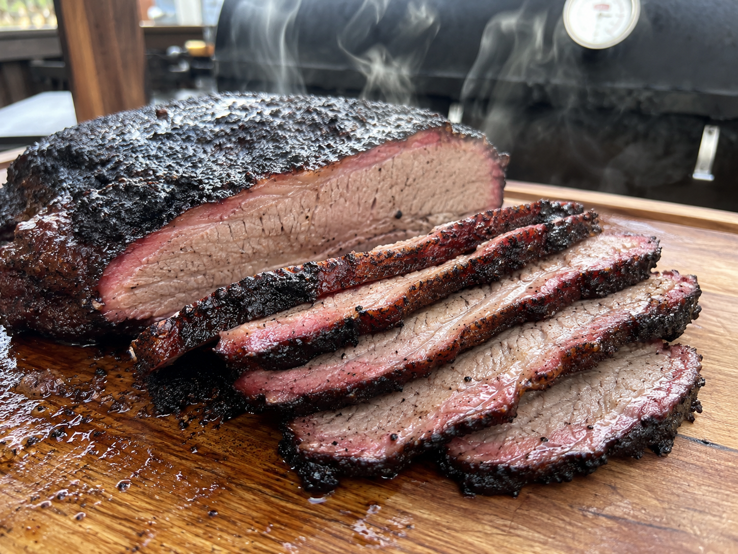 Sliced smoked brisket with dark bark